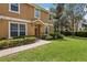Charming home with well-maintained lawn and landscaping around the entrance at 7001 Interbay Blvd # 203, Tampa, FL 33616