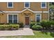 Charming home with well-maintained lawn and landscaping around the entrance at 7001 Interbay Blvd # 203, Tampa, FL 33616