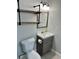 Renovated bathroom with a new vanity, modern lighting, and updated fixtures for a fresh look at 7301 Mitchell Ranch Rd, New Port Richey, FL 34655