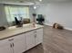Bright, open living space with hard floors and large windows at 7301 Mitchell Ranch Rd, New Port Richey, FL 34655