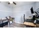 Home office with wood flooring, ceiling fan and custom trim work at 7405 French Marigold Ave, Tampa, FL 33619