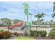 Fun splashpad with a dumping bucket feature and a slide for to enjoy in the community at 7405 French Marigold Ave, Tampa, FL 33619