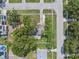Aerial view of a home showcasing its spacious backyard and convenient access to nearby streets at 8897 54Th N St, Pinellas Park, FL 33782
