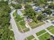 An aerial view of a charming single-story home on a verdant lot with mature trees in a quiet neighborhood at 8897 54Th N St, Pinellas Park, FL 33782