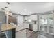Bright kitchen featuring stainless steel appliances, modern lighting, and ample counter space at 8897 54Th N St, Pinellas Park, FL 33782