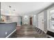 Open-concept living space featuring modern lighting and neutral paint at 8897 54Th N St, Pinellas Park, FL 33782