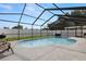 Screened-in swimming pool offers a private oasis for relaxation and outdoor enjoyment at 9105 Camino Villa Blvd, Tampa, FL 33635