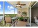 Relax on this screened lanai with picturesque waterfront views, and dining area with comfortable seating at 10002 Key Haven Rd # 503, Seminole, FL 33777