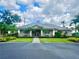 Charming clubhouse with well-manicured landscaping and a welcoming entrance at 10002 Key Haven Rd # 503, Seminole, FL 33777