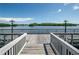 Waterfront property with a wooden dock that shows a peaceful view of a the water at 10002 Key Haven Rd # 503, Seminole, FL 33777