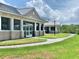 Exterior view of a building with well-manicured lawn at 10002 Key Haven Rd # 503, Seminole, FL 33777