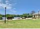 Outdoor firepit with bench seating area, perfect for gatherings at 10002 Key Haven Rd # 503, Seminole, FL 33777