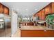 Modern kitchen features stainless steel appliances, granite countertops, and ample cabinet space, ideal for cooking at 10002 Key Haven Rd # 503, Seminole, FL 33777