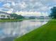 Scenic view of the lake with a fountain at 10002 Key Haven Rd # 503, Seminole, FL 33777