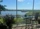Relaxing screened lanai with seating and views of the water, perfect for enjoying outdoor moments at 10002 Key Haven Rd # 503, Seminole, FL 33777