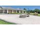 Community pavilion with firepit, seating and landscaped grounds at 10002 Key Haven Rd # 503, Seminole, FL 33777