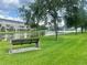Beautiful community pond view with seating and lush green surroundings at 10002 Key Haven Rd # 503, Seminole, FL 33777