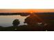 Scenic water view at sunset showcasing the serene beauty of the surrounding nature and landscape at 10002 Key Haven Rd # 503, Seminole, FL 33777