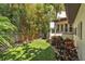 The backyard is landscaped with bamboo, palm trees and plush artificial turf at 101 Bandera Ne Way, St Petersburg, FL 33704