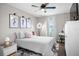 Cozy bedroom features a plush rug, comfy bed with a pink heart pillow, and stylish decor at 10624 Aldo Moro Dr, Wimauma, FL 33598