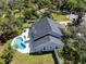 Back aerial view of a single-Gathering home with a pool and a well-manicured yard at 11203 Egret Nest Ct, Riverview, FL 33569