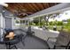 Relaxing screened porch with views of the backyard, pool, and outdoor seating area at 11203 Egret Nest Ct, Riverview, FL 33569