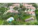 Beautiful aerial shot of the community, highlighting the pool, recreation area, and the home's location at 11501 Cerca Del Rio Pl, Temple Terrace, FL 33617