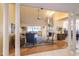 Spacious living room with high ceilings, fireplace, and ample natural light at 11501 Cerca Del Rio Pl, Temple Terrace, FL 33617