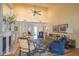 Open-concept living room featuring vaulted ceilings, hardwood floors and ample seating at 11501 Cerca Del Rio Pl, Temple Terrace, FL 33617