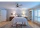 Inviting main bedroom with hardwood floors, natural light, and stylish decor at 11501 Cerca Del Rio Pl, Temple Terrace, FL 33617