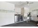Functional laundry room featuring new washer and dryer, sink, and ample space at 12156 Meadowbrook Ln, Largo, FL 33774