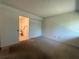 Carpeted bedroom offers a closet for storage and an ensuite bathroom for convenience at 12300 Vonn Rd # 9105, Largo, FL 33774