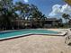 Resort style pool with brick pavers and turquoise blue water offers the perfect oasis for relaxation and socializing at 12300 Vonn Rd # 9105, Largo, FL 33774