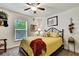 Cozy bedroom with comfy bed and window view at 12411 Talpa St, Spring Hill, FL 34608