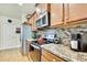 The kitchen features stainless steel appliances and granite countertops at 12411 Talpa St, Spring Hill, FL 34608