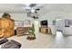Open-concept living room boasts vaulted ceilings, neutral décor, and seamless flow to other living spaces at 12411 Talpa St, Spring Hill, FL 34608