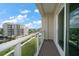 This balcony offers a beautiful view of a green lawn and the community at 125 Belleview Blvd # 503, Belleair, FL 33756