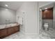 A marble floor provides luxury to this bathroom with a bathtub and water closet at 125 Belleview Blvd # 503, Belleair, FL 33756