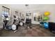 Well-equipped gym with modern exercise machines, free weights, and mirrors at 125 Belleview Blvd # 503, Belleair, FL 33756
