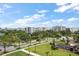 A scenic high-angle view of the community, trees, and water at 125 Belleview Blvd # 503, Belleair, FL 33756