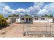 Beautiful single story home with modern updates, a paver parking area, and fenced yard at 1328 Waikiki Way, Tampa, FL 33619