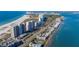 A stunning aerial view shows the beachfront property next to the ocean at 1340 Gulf Blvd # 16F, Clearwater, FL 33767