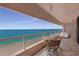 Large balcony with outdoor seating and stunning views of the Gulf Coast beach and ocean at 1340 Gulf Blvd # 16F, Clearwater, FL 33767