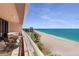 Stunning balcony view of ocean with seating and coastal ambiance at 1340 Gulf Blvd # 16F, Clearwater, FL 33767