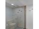 Elegant shower with pebble floor and glass door at 1340 Gulf Blvd # 16F, Clearwater, FL 33767