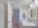 Bright bathroom featuring a sleek vanity and an open doorway enhancing the space at 1340 Gulf Blvd # 16F, Clearwater, FL 33767