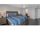 Relaxing bedroom with calming colors, ceiling fan, and warm decor at 1340 Gulf Blvd # 16F, Clearwater, FL 33767