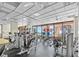 Fully equipped community fitness center with weight machines and mirrored walls at 1340 Gulf Blvd # 16F, Clearwater, FL 33767