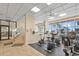 This community fitness center is equipped with stationary bikes, stair steppers, and open windows at 1340 Gulf Blvd # 16F, Clearwater, FL 33767
