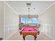 Game room with a billiard table and views of the ocean at 1340 Gulf Blvd # 16F, Clearwater, FL 33767